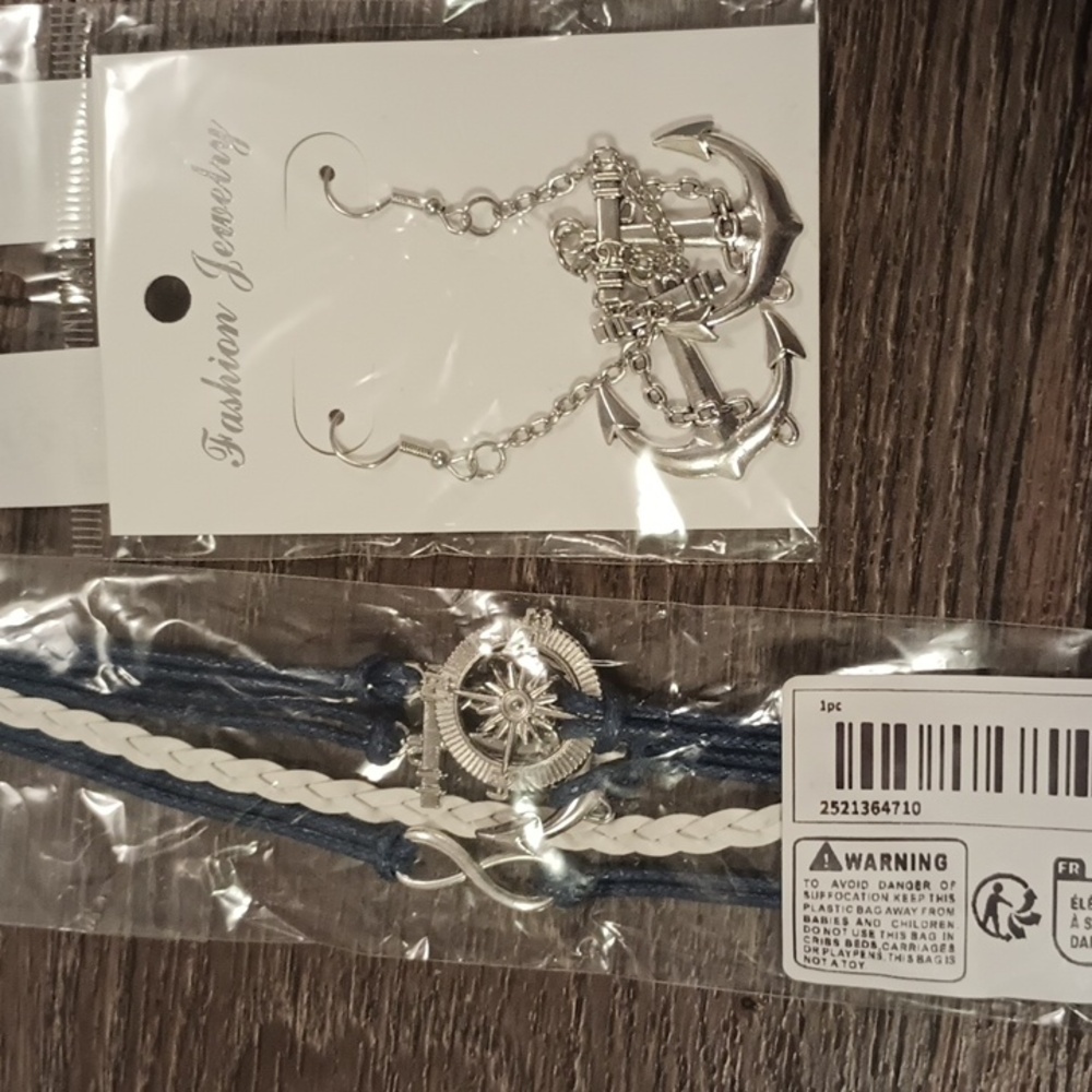 5/$20 NWT Anchor dangle earrings and multi layer bracelet.